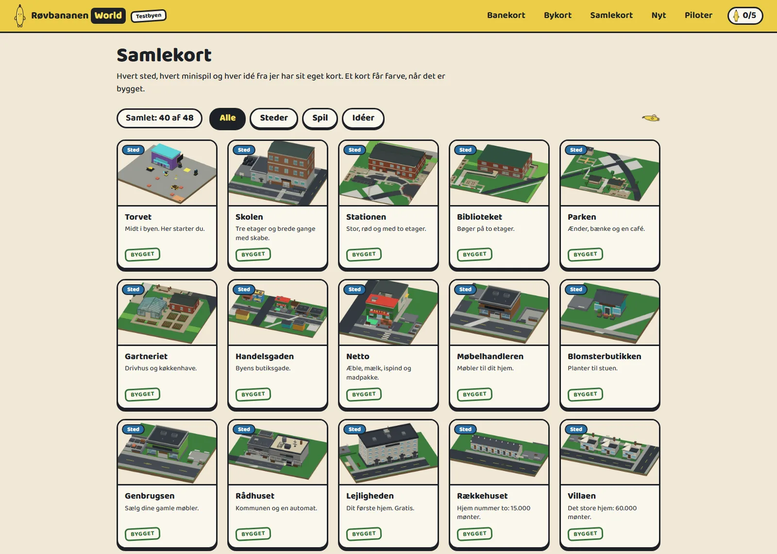 Samlekortene: et gitter af kort med tegninger af Torvet, Skolen, Stationen, Biblioteket, Parken og Gartneriet, hver med et grønt stempel, hvor der står «Bygget».
